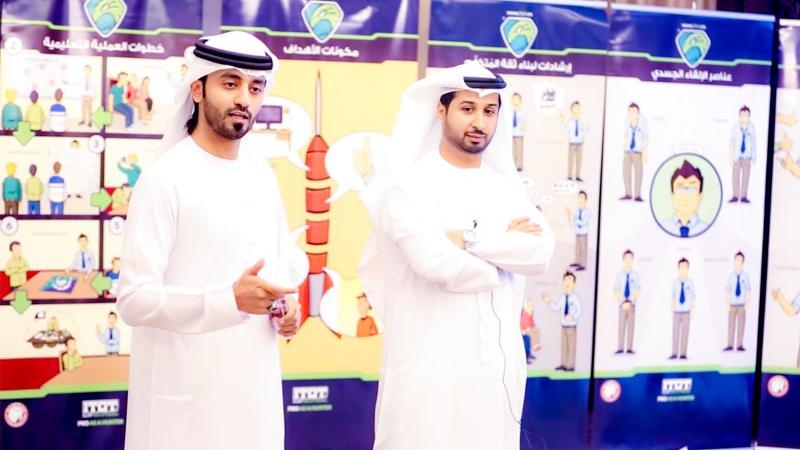 senior trainer Majed and media trainer Faisal during the course