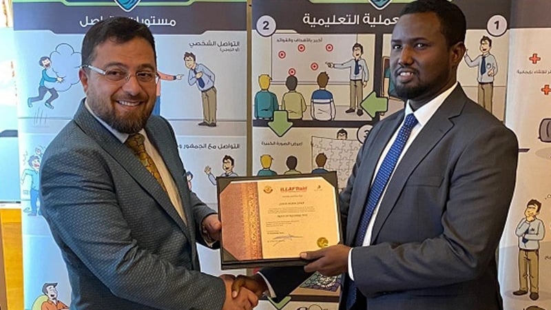 Dr. Mohammed Pedra presenting the certificates